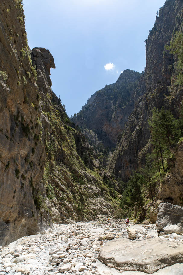 Samaria Gorge of Crete, Greece. Towering cliffs on either side of a dried up river bed. This is one of the best hikes in Europe and is a must on any Crete itinerary