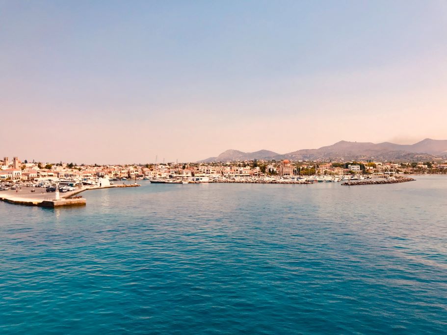Town on Aegina Island at sunset. This island close to Athens is the perfect day trip to experience the Saronic Gulf.