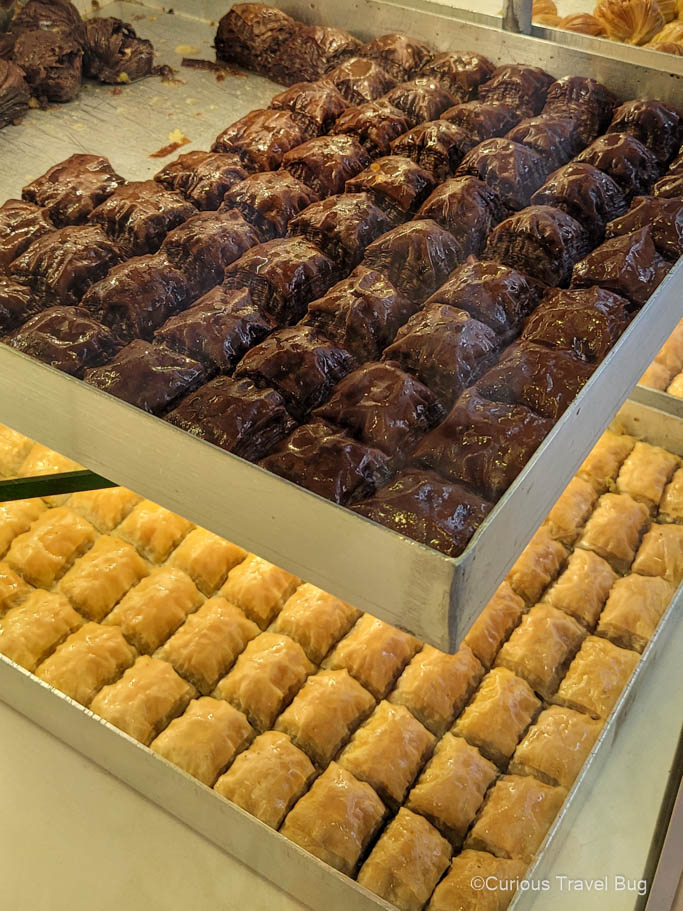 A tray of chocolate and walnut baklava in Athens. Baklava is a must try dessert while visiting Athens