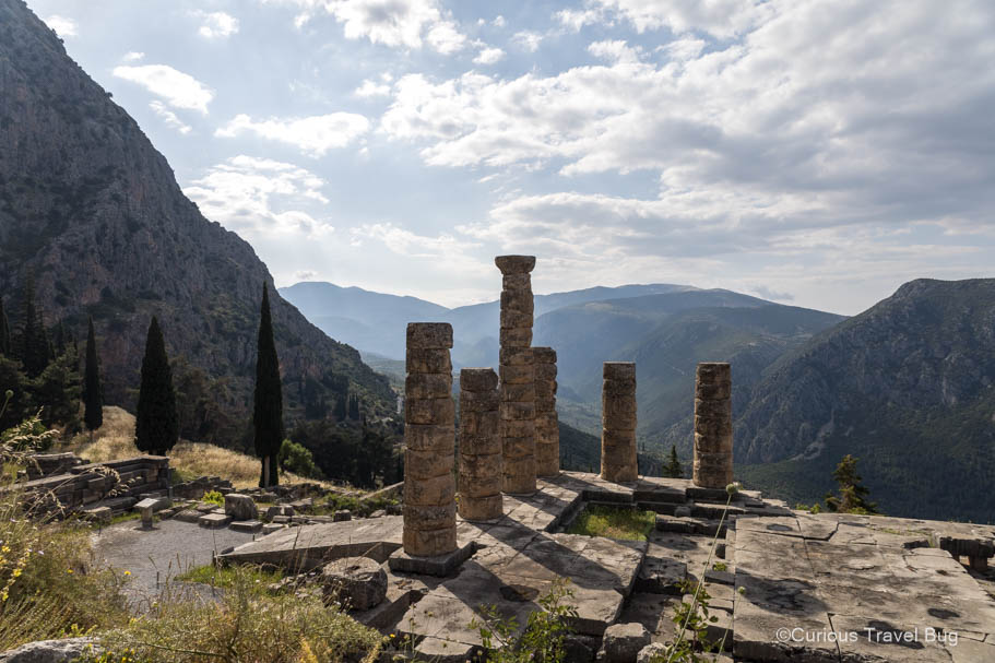 Temple of Apollo ruins at Delphi on Mount Parnassus in Greece. Delphi is perfect as a side trip from Athens if you have four days in the capital of Greece