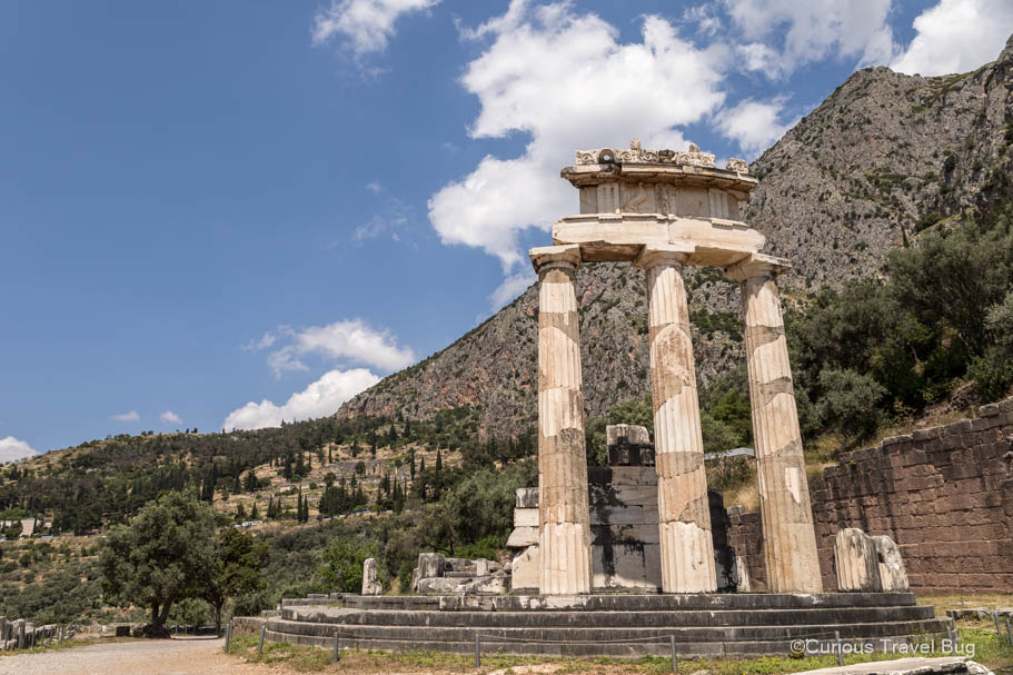 Temple of Athena with views of Mount Parnassus in the background in Delphi, Greece
