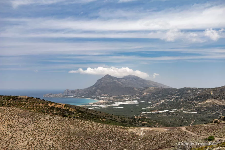 View of Falasarna Beach and Balos Mountain in the background on the road to Elafonisi Beach, Crete