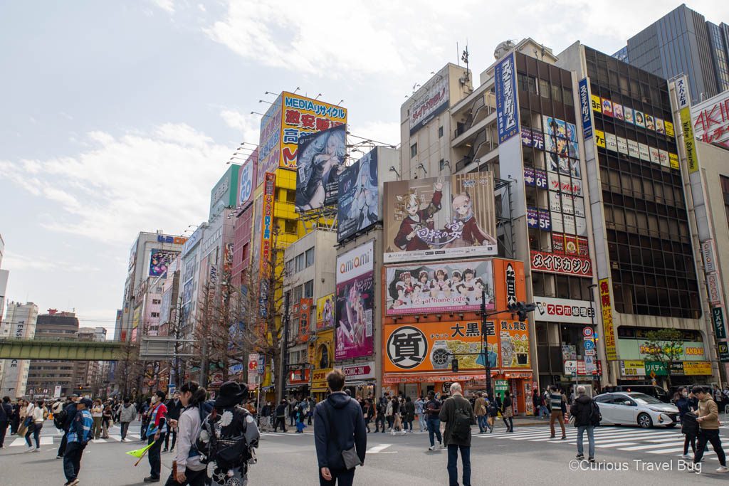 The closed streets of Akihabara, Japan with the streets open to pedestrians and many billboards in the background